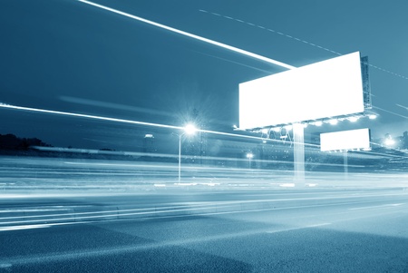 Blank billboard in the city with heavy trafficの写真素材