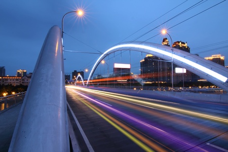 Modern city bridge at nightの写真素材