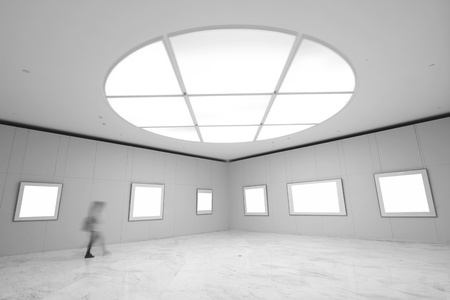 empty frames in a room against a white wallのeditorial素材