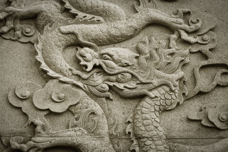 The Chinese dragon carved in stoneの写真素材