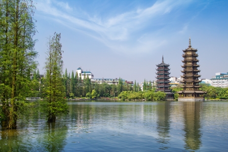 golden tower and silver tower in the lakeのeditorial素材
