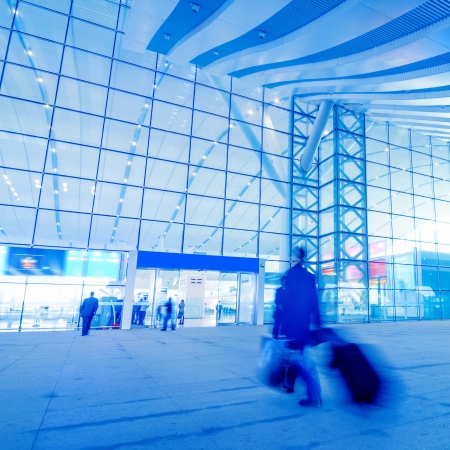passengers motion blur in shenzhen train station waiting hallのeditorial素材