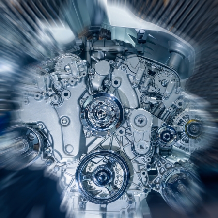Car engine closeup, focus on pulleyの写真素材