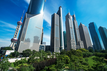 The grass and the city in shanghai,chinaのeditorial素材