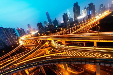 beautiful city interchange overpass at nightfall in shanghaiの写真素材
