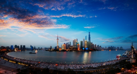 panoramic view of shanghai skyline with huangpu river at duskのeditorial素材