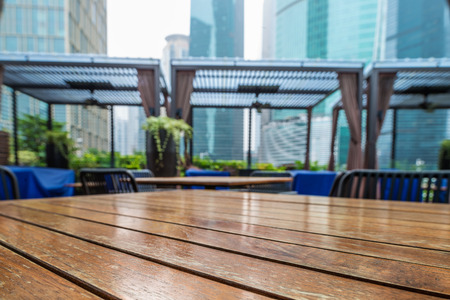 Wooden table in the outdoor coffee roomの写真素材