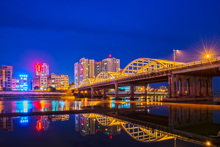 bridge and city at nightの写真素材
