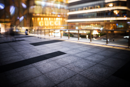 the light trails on the modern building background in shanghai chinの写真素材