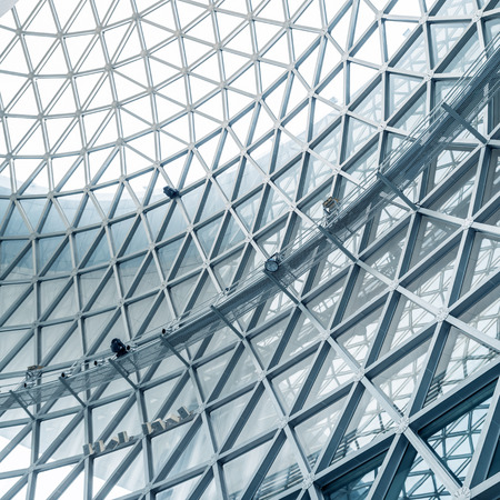 image of windows in morden office buildingの写真素材