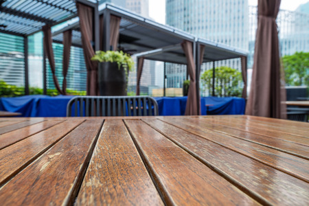 Wooden table in the outdoor coffee roomの写真素材