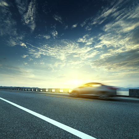At dusk highway, modern transportation fantasy landscapeの写真素材