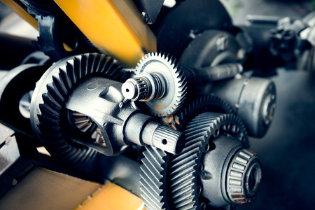 Cogwheels machinery , engineering and industry or concepts such as teamwork and search engineの写真素材