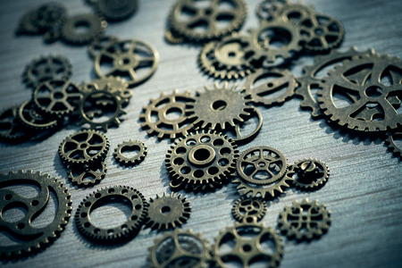 Technology background with metal gears and cogwheelsの写真素材