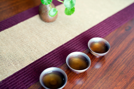 Asian tea set on wooden tableの写真素材