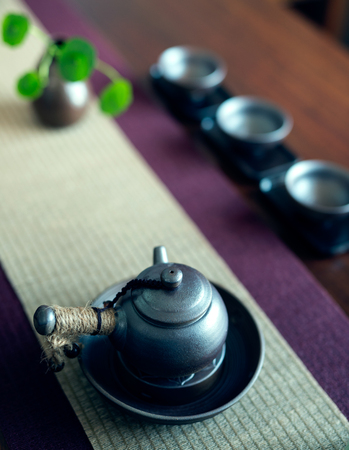 Asian tea set on wooden tableの写真素材