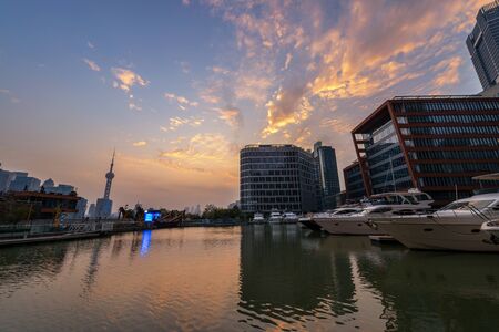 the marina and shanghai at nightの写真素材