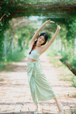 fashion girl in the gardenの写真素材