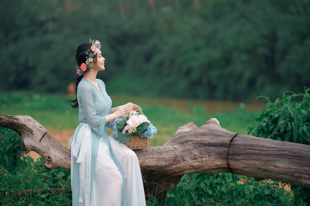 fashion girl in the gardenの写真素材