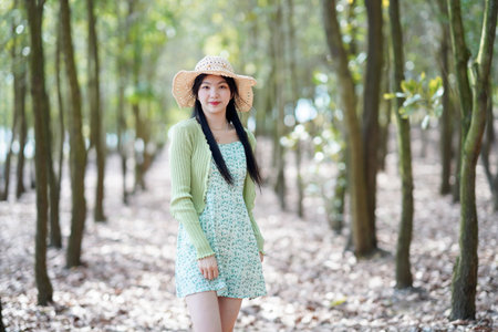 portrait of romantic girl in the woodsの写真素材