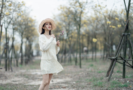 portrait of romantic girl in the woodsの写真素材