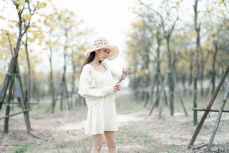 portrait of romantic girl in the woodsの写真素材
