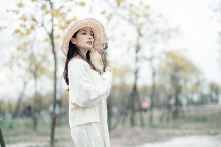 portrait of romantic girl in the woodsの写真素材