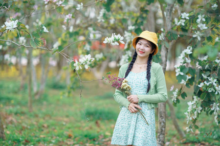 portrait of romantic girl in the woodsの写真素材