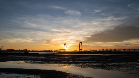 bay bridge in sunset of chinaの写真素材