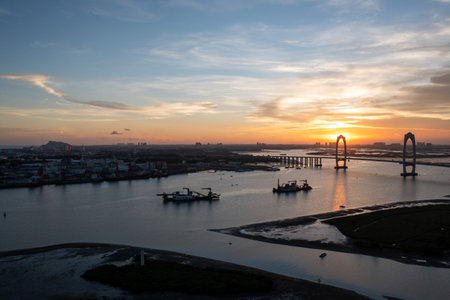 bay bridge in sunset of chinaの写真素材