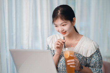 Beautiful young girls are using laptops