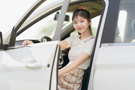 Female driver beginner sitting in a carの写真素材