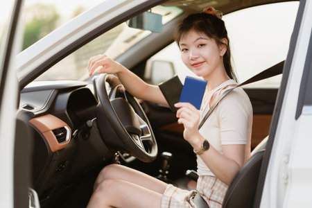 Female driver beginner sitting in a carの写真素材