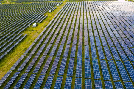 aerial view of solar power panels in clean energy generating stationの写真素材