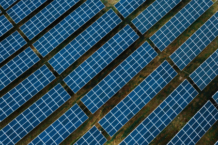 aerial view of solar power panels in clean energy generating stationの写真素材