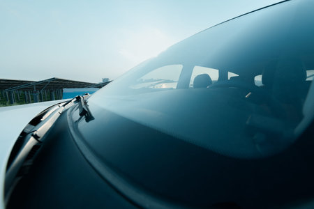car windshields at the sun rays, vehicle exterior