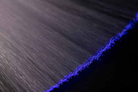 optical fiber is isolated on a black backgroundの写真素材