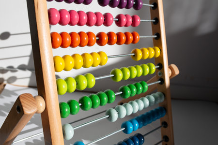Bright colored hand abacus. Children's wooden toys for the study of arithmetic.の写真素材