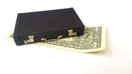 One us dollar under the suitcaseの写真素材