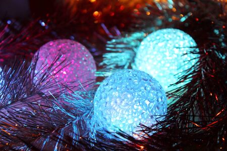 Christmas balls with lights background. Christmas evening. Happy New Year.の写真素材