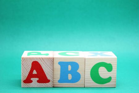 English ABC letters on wooden toy blocks. letters of the English alphabet Learn foreign languages. English for beginners. Copy space.の写真素材