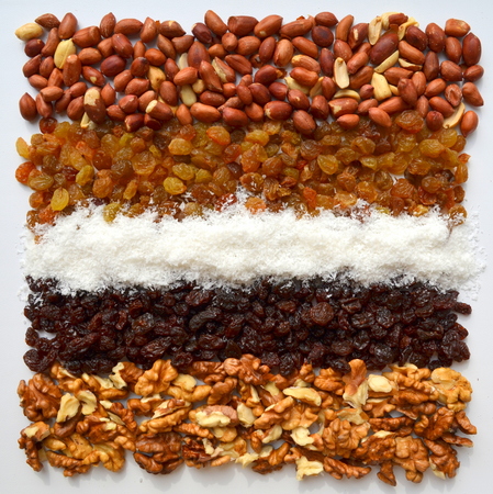 Raisins, peanuts, coconut, walnutsの写真素材