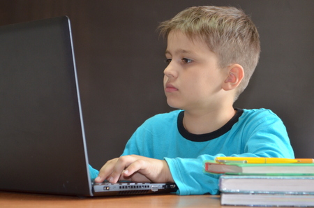 Boy with laptopの写真素材
