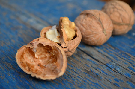 walnut on wooden background