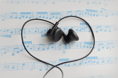 Headphones on the background notes
