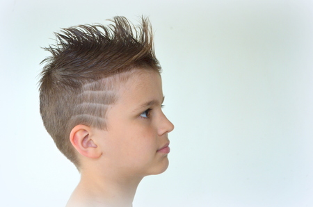 Boy with mohawk hairstyleの写真素材