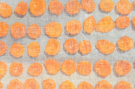 raw apricots pittedの写真素材