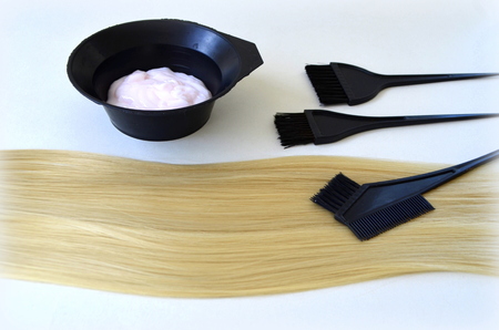 Paint and brush for dyeing hair and strandの写真素材