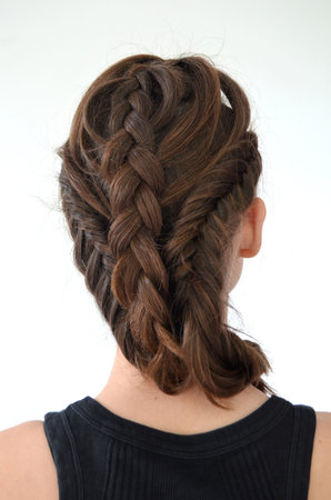 Hairstyle braiding on medium length - fish tail