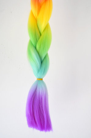 Kanekalon. Colored artificial strands of hair. Material for plaiting braids